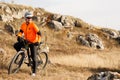 Mountain Bike cyclist riding Meadow track Royalty Free Stock Photo