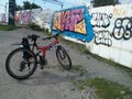 Mountain bike in front of graffiti wall Royalty Free Stock Photo