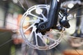 Mountain bike front wheel with mechanical disc brake closeup Royalty Free Stock Photo