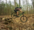 Mountain bike jump off rock pile