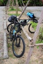 Mountain bike and packing for long trip parking at garden Royalty Free Stock Photo