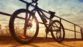 Mountain bike parked against rails