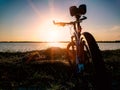 Mountain bike parking at lake in the morning