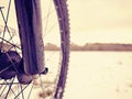 Mountain bike in powder snow. Lost path in snowdrift. Wheel detail Royalty Free Stock Photo