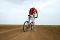 Mountain bike race on ground road Royalty Free Stock Photo