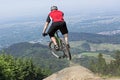 Mountain bike rider jumping precipice Royalty Free Stock Photo