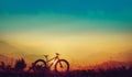 Golden sky sunset and mountain bike silhouette, silhouette fat bike, Silhouette Bicycle on mountain background Royalty Free Stock Photo