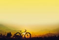 Golden sky sunset and mountain bike silhouette, silhouette fat bike, Silhouette Bicycle on mountain background Royalty Free Stock Photo