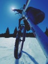 Front wheel of mountain bike blocked in snow. Snow riding. Royalty Free Stock Photo