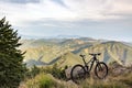 Mountain bike sunset silhouette on forest trail, inspiring lands Royalty Free Stock Photo