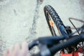 Mountain bike tyres outside, blurry handlebar, summer day, city mobility Royalty Free Stock Photo
