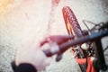 Mountain bike tyres outside, blurry handlebar, summer day, city mobility Royalty Free Stock Photo