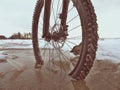 Mountain bike wheel broke through ice into water. Enjoy winter biking with fun Royalty Free Stock Photo