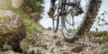 Mountain bike wheel on a gravel track Royalty Free Stock Photo