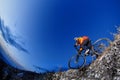 Mountain biker in action across rocks Royalty Free Stock Photo