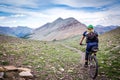 Mountain biker on alpine singletrack.