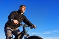 Mountain Biker and blue sky background