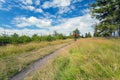 Mountain biker cycling riding in woods and mountains Royalty Free Stock Photo