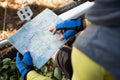 Mountain biker looking at map