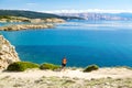 Mountain biker looking at sea view, riding a bike Royalty Free Stock Photo