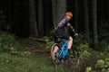 Mountain biker riding on bike in autumn inspirational mountains landscape banner. Man cycling MTB on enduro trail track. Sport Royalty Free Stock Photo