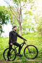 Mountain biker riding on bike in inspirational mountains landscape. . Sport fitness motivation and inspiration Royalty Free Stock Photo