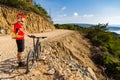 Mountain biker riding on bike at the sea Royalty Free Stock Photo