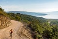 Mountain biker riding on bike at the sea Royalty Free Stock Photo