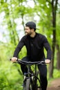 Mountain biker riding on bike in spring inspirational mountains landscape. Sport fitness motivation and inspiration. Rider Royalty Free Stock Photo