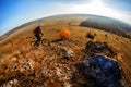 Mountain biker riding on bike at summer mountains. inspiration in beautiful inspirational landscape. Royalty Free Stock Photo