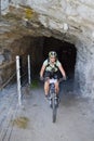 Mountain biker riding though Swiss mountain area