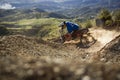 Mountain Biker skids around a dusty corner