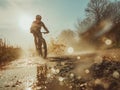 Mountain Biker Splashing Through Mud Puddle Royalty Free Stock Photo