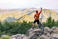 Mountain biker success, looking at mountains view Royalty Free Stock Photo