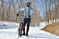 Mountain biker in winter snow