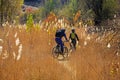 Mountain bikers biking in Alborz mountains during colorful autumn