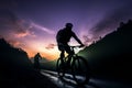 Mountain bikers enjoy a twilight ride through scenic, hilly landscapes Royalty Free Stock Photo