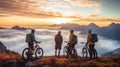 Mountain Bikers At Sunrise: Ethereal Cloudscape Photography