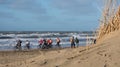 Mountain bikers taking part in the beach race Egmond-Pier-Egmond ride along the sea shore Royalty Free Stock Photo