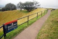 Mountain bikers walking path park sign