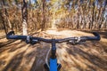 Mountain biking down hill descending fast on bicycle. Royalty Free Stock Photo