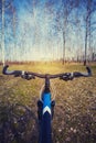 Mountain biking down hill descending fast on bicycle. Royalty Free Stock Photo