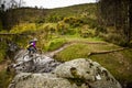 Mountain Biker crossing a stream in Ireland