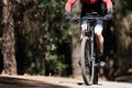 Mountain biking man riding on bike in summer mountains forest Royalty Free Stock Photo