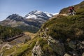 Mountain Biking on a narrow trail in the Swiss Alps