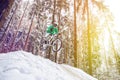 Mountain biking in snowy forest Royalty Free Stock Photo