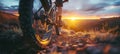 Mountain biking at sunset, capturing essence of adventure and outdoor thrill. Silhouette of cyclist on rugged trail against golden