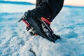 Mountain Boot with crampons on while hiking in the mountains in winter. Royalty Free Stock Photo