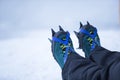 Mountain boots with crampons on the ice. Royalty Free Stock Photo