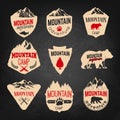 Mountain camp badges templates with mountains and trees isolated